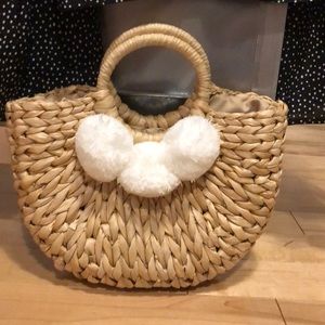 Puff ball woven purse